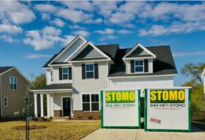 Family discussing storage sizes with manager, banner reads Find The Right Fit